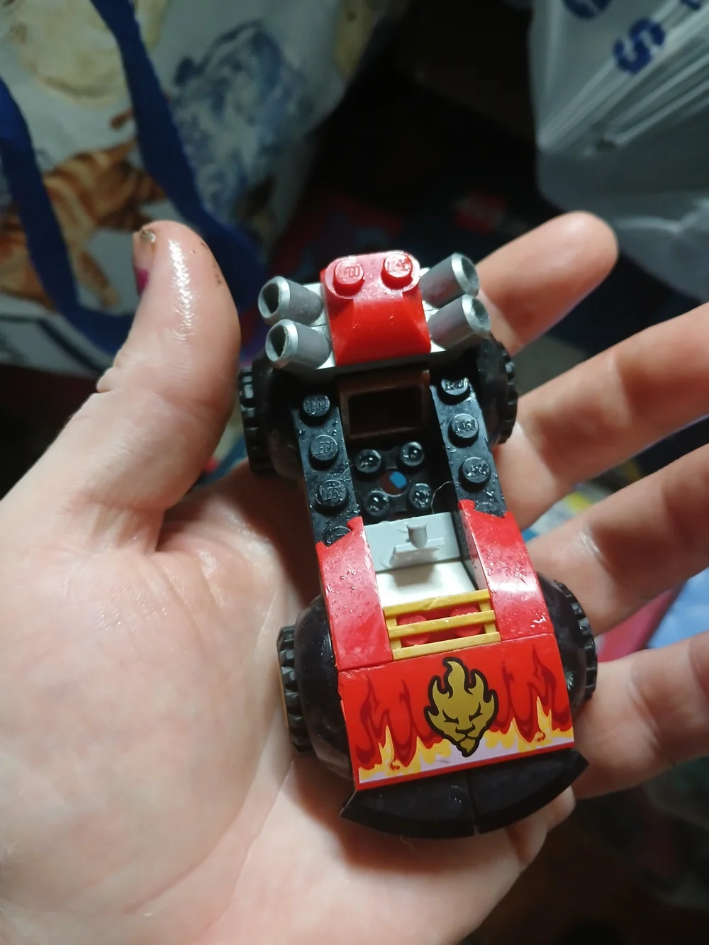 LEGO Ninjago vehicle, likely from the Kai's Ninja Race Car EVO (71780) set.